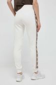 Спортивні штани Guess колір бежевий з аплікацією (3309218) Спортивні штани Guess колір бежевий з аплікацією (3309218)