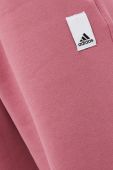 Спортивні штани adidas колір помаранчевий з аплікацією Спортивні штани adidas колір помаранчевий з аплікацією