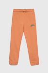 Дитячі бавовняні штани Guess колір помаранчевий однотонні Дитячі бавовняні штани Guess колір помаранчевий однотонні