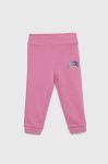Дитячі бавовняні штани Guess колір фіолетовий однотонні (2911536) Дитячі бавовняні штани Guess колір фіолетовий однотонні (2911536)