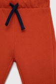 Дитячі бавовняні штани United Colors of Benetton колір червоний однотонні (3053135)