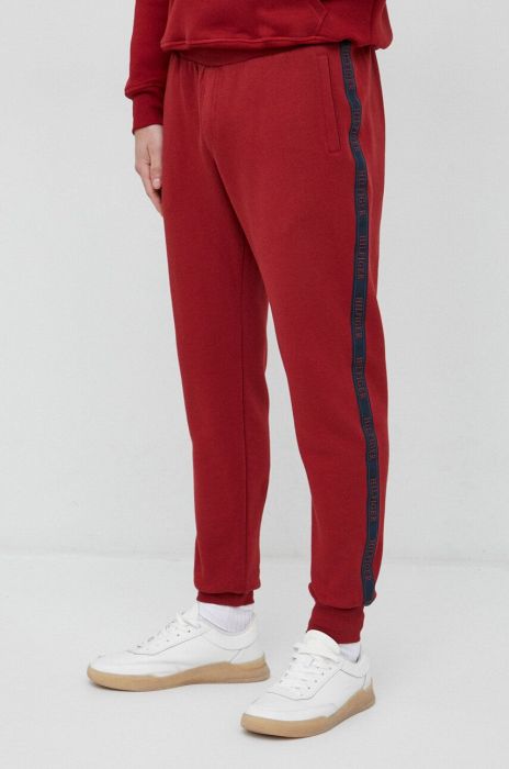 Бавовняні спортивні штани Tommy Hilfiger чоловічі колір червоний з аплікацією Бавовняні спортивні штани Tommy Hilfiger чоловічі колір червоний з аплікацією