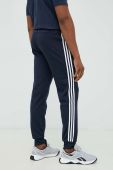 Спортивні штани adidas чоловічі колір синій з аплікацією