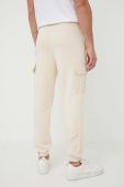 Спортивні штани Alpha Industries колір бежевий однотонні Спортивні штани Alpha Industries колір бежевий однотонні