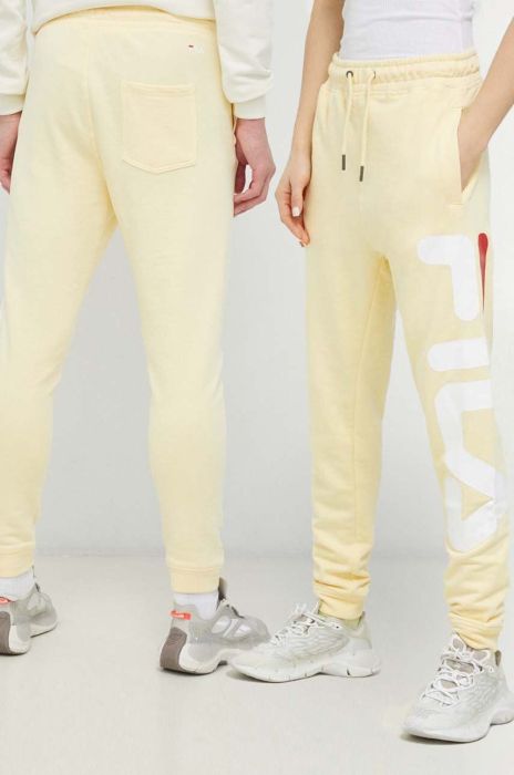 Спортивні штани Fila колір жовтий візерунок