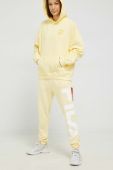 Спортивні штани Fila колір жовтий візерунок