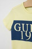 Дитяча бавовняна футболка Guess колір зелений з принтом (3015535)