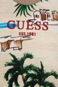Дитяча бавовняна футболка Guess колір бежевий візерунок (3133449) Дитяча бавовняна футболка Guess колір бежевий візерунок (3133449)