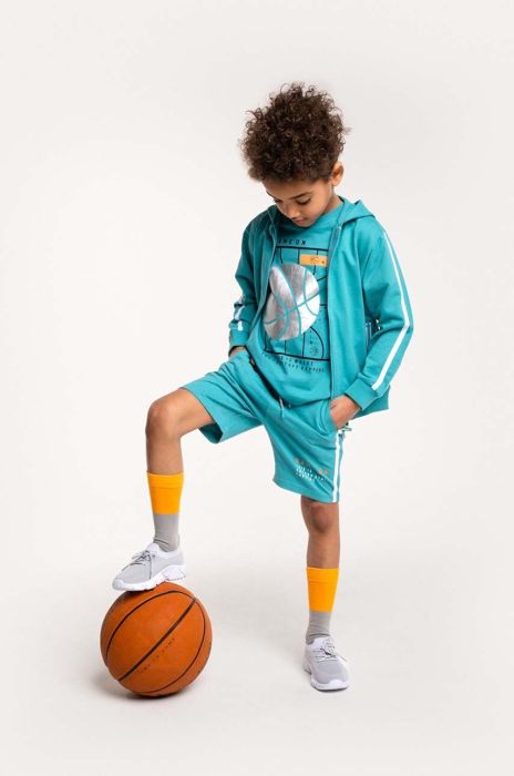 Дитяча бавовняна футболка Coccodrillo колір бірюзовий з принтом (2991574) Дитяча бавовняна футболка Coccodrillo колір бірюзовий з принтом (2991574)