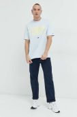 Бавовняна футболка Tommy Jeans з принтом колір блакитний (2936876)