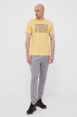 Бавовняна футболка Puma колір жовтий з принтом Бавовняна футболка Puma колір жовтий з принтом